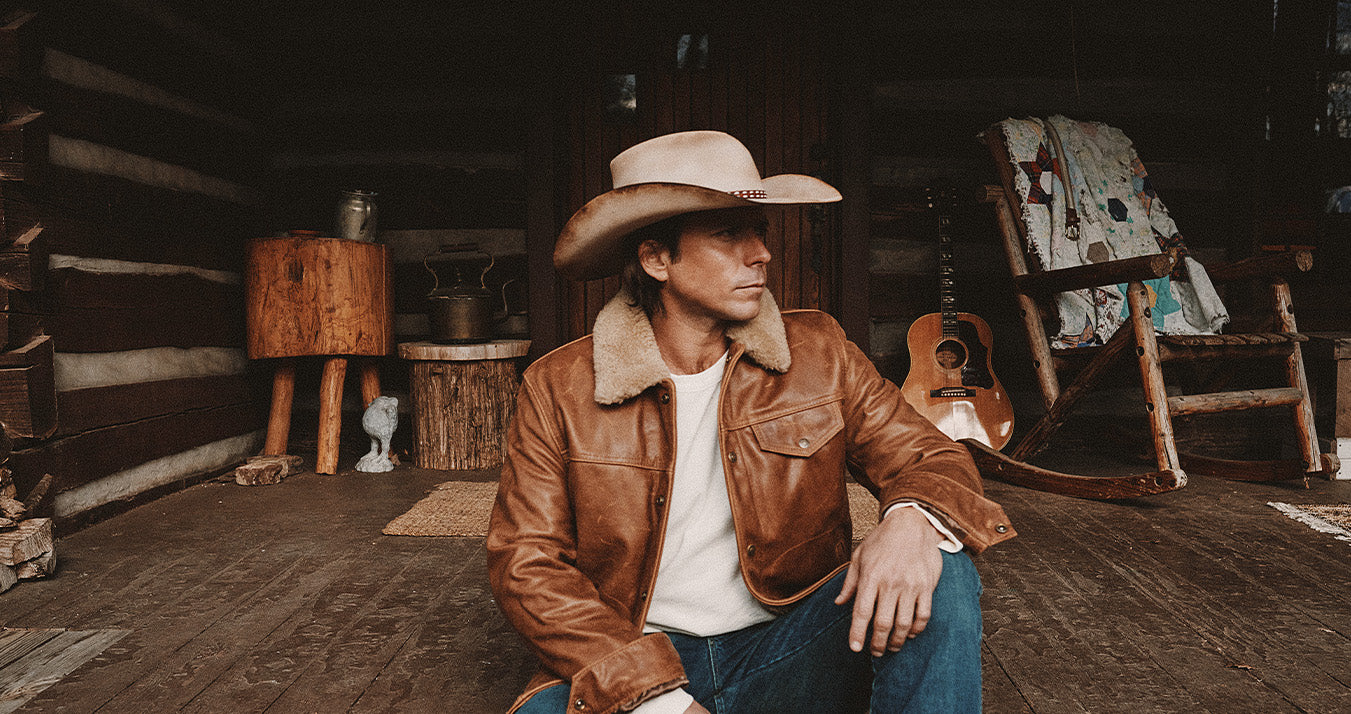 Lukas Nelson sitting on his porch